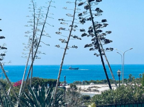 Seaview apartment with garden & pool